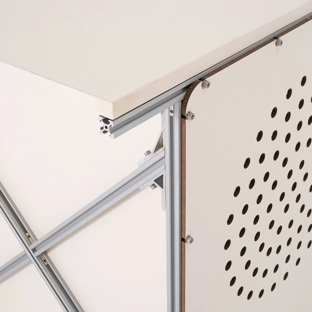 Pegboard panel and aluminum frame connection detail
